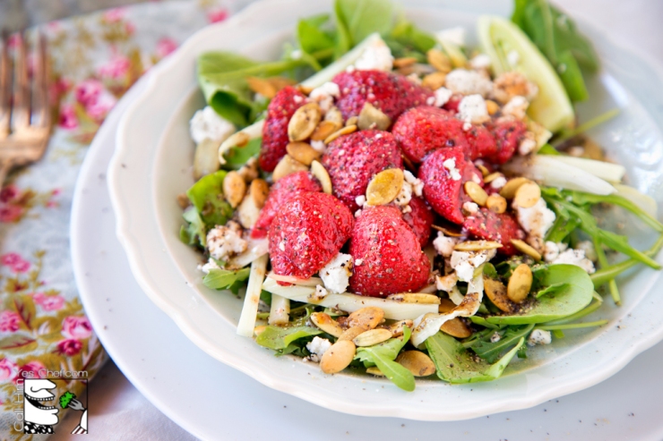 Beautiful marinated strawberries are the star in this salad.